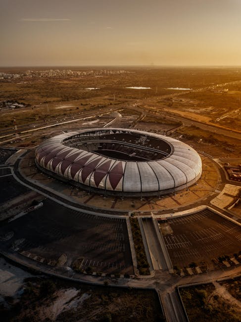 Aerial shot of Estádio 11 de Novembro in Luanda, Angola during sunset, capturing its modern architecture.